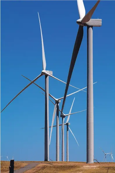  ?? GREG SORBER/ALBUQUERQU­E JOURNAL ?? Some of the 142 wind turbines in operation at Avangrid Renewables’ El Cabo Wind Farm near Encino.