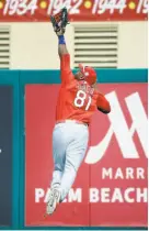  ?? Jeff Roberson / Associated Press 2016 ?? Anthony Garcia makes a catch for the Cardinals during a 2016 spring game.