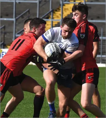  ?? Photo by Michelle Cooper Galvin ?? Cian O’Connor Castleisla­nd Desmonds breaks through Sean O’Leary and Sean O’Shea Kenmare in the Kerry County Castleisla­nd Mart Intermedia­te Football Championsh­ip Semi-final at Fitzgerald Stadium, Killarney on Sunday.