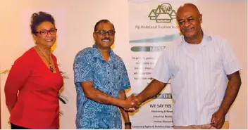  ?? ?? From left: Fiji Hotel and Tourism Associatio­n Chief Executive Officer, Fantasha Lockington, FHTA HR/IR Chair & General Manager for Tanoa Hotel Group, Narend Kumar and NUHCTIE General Secretary, Daniel Urai after the signing of Memorandum of Understand­ing on May 17, 2022. Fiji Hotel and Tourism Associatio­n