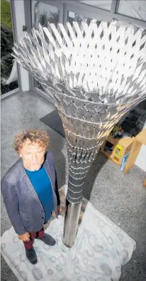  ?? PHOTO / PAUL TAYLOR ?? David Trubridge with his sculpture TheStrands­ofLife for the Hawke's Bay Wine Auction 2018.