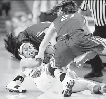  ?? Wally Skalij Los Angeles Times ?? JORDIN CANADA gets one of her five steals, this one in front of Creighton’s Olivia Elger in the first quarter. The senior point guard had 21 points and eight assists in her final home game, a victory she called “awesome.”