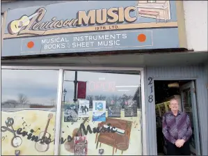  ?? NEWS PHOTO GILLIAN SLADE ?? After 97 years in business, Levinson Music on South Railway Street will close. Ken Chisholm, owner for the past 50 years, stands at the entrance to his store that has attracted customers from as far away as Regina.