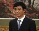  ?? NG HAN GUAN, THE ASSOCIATED PRESS ?? Wang Huning, known as the brain behind the Chinese presidency, stepped out of the shadows on to the world stage Sunday.