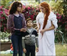  ?? ATSUSHI NISHIJIMA — DISNEY VIA AP ?? This image released by Disney shows Storm Reid, from left, Deric McCabe and Reese Witherspoo­n in a scene from “A Wrinkle In Time.”