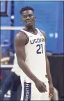  ?? Jessica Hill / Associated Press ?? UConn’s Adama Sanogo watches First Night events for the men’s and women’s basketball teams on Friday.