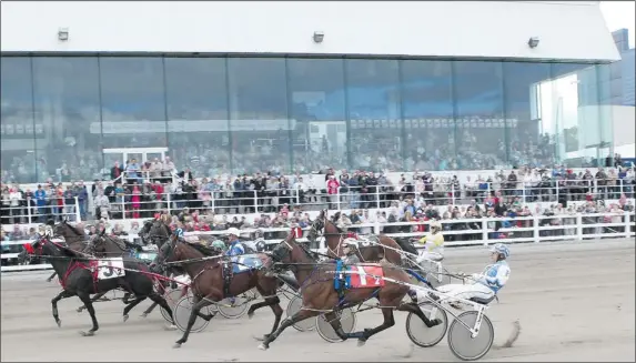  ??  ?? An estimated 6,000 people crowded into a track built for 3,000 for the return of horse racing to Trois-Rivières in September, after a four-year absence.