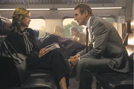  ?? Jay Maidment / Lionsgate ?? Vera Farmiga is a mysterious woman who presents the just-laid-off Liam Neeson with a way to make money but, of course, things get complicate­d and Neeson’s everyman rises to the action-packed occasion in “The Commuter.”