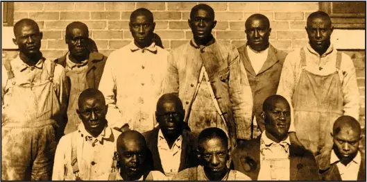  ?? Arkansas History Commission ?? The Elaine Twelve, who were sentenced to death after the 1919 Elaine Massacre. The men, represente­d by Little Rock attorney Scipio Jones, were eventually freed.