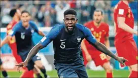  ?? ASSOCIATED PRESS NATACHA PISARENKO/THE ?? France’s Samuel Umtiti celebrates after scoring the first and only goal of Tuesday’s semifinal match against Belgium at St. Petersburg Stadium in, St. Petersburg, Russia.