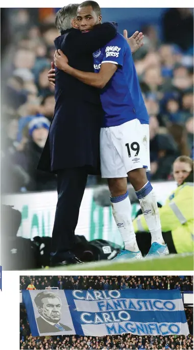  ?? GETTY IMAGES ?? In alto, Ancelotti abbraccia Djibril Sidibe, 27 anni. Qui sopra, striscione dei tifosi dell’Everton