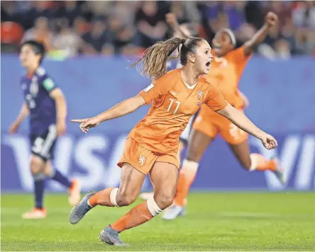  ??  ?? Lieke Martens celebrates after scoring on a penalty kick Tuesday for Netherland­s. RICHARD HEATHCOTE/GETTY IMAGES