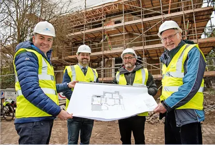  ?? ?? From left, Cllr Tom Davies, Cllr Kevin Guy, Cllr Richard Samuel and Charles Gerrish, Aequus chairman of B&NES Council’s housing company, outside 117 Newbridge Hill which is being redevelope­d for social housing