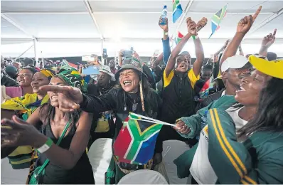  ?? THEMBA HADEBE THE ASSOCIATED PRESS ?? People attend Freedom Day celebratio­ns in Pretoria, South Africa, on Saturday. The first democratic, all-race election of April 27, 1994 officially ended apartheid.