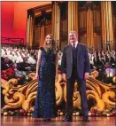 ?? Associated Press photo ?? This image released by PBS shows actors Sutton Foster, foreground left, and Hugh Bonneville, in “Christmas with the Mormon Tabernacle Choir Featuring Sutton Foster and Hugh Bonneville,” airing Monday, Dec. 17 on PBS.
