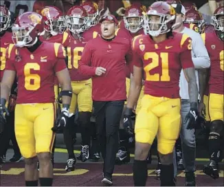  ?? Luis Sinco Los Angeles Times ?? DONTE WILLIAMS, above, took over for Clay Helton, but he’s one of many within USC’s football operations who don’t know what their future holds in the program under new coach Lincoln Riley.