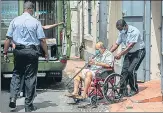  ?? AP ?? Mehul Choksi is taken to a police van on a wheelchair after attending a court hearing, in Roseau, Dominica, on Thursday.