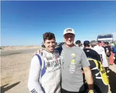  ?? ?? ON CLOUD NINE . . . It’s all smiles as Zimbabwean motorbike rider Ashley Thixton (left) is joined by his father, Trevor, in celebratin­g his latest achievemen­t of lasting the distance at the 2024 Dakar Rally in Saudi Arabia yesterday