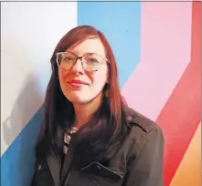  ?? [DOUG HOKE/THE OKLAHOMAN] ?? Krystle Brewer, executive director of the Oklahoma Visual Arts Coalition, talks about “Momentum” 2019 at The Womb on March .