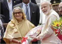  ??  ?? NEW DELHI: Bangladesh­i Prime Minister Sheikh Hasina (left) and her Indian counterpar­t Narendra Modi pose for the media as Hasina is greeted by Modi upon her arrival in New Delhi, India on Friday, April 7, 2017. Hasina is on a four-day state visit to...