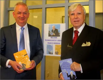  ??  ?? Librarian Jarlath Glynn with Francis Brennan at Enniscorth­y Library last week.