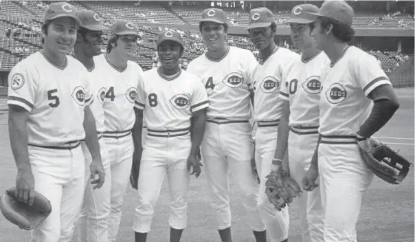  ?? GANNETT NEWS SERVICE, COURTESY OF THE CINCINNATI REDS VIA USA TODAY ?? Members of the Cincinnati Reds’ “Big Red Machine.’’ From left to right: Catcher Johnny Bench, right fielder Ken Griffey, third baseman Pete Rose, second baseman Joe Morgan, first baseman Tony Perez, left fielder George Foster, center fielder Cesar Geronimo and shortstop Dave Concepcion.