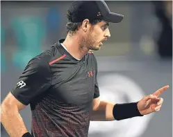  ??  ?? Andy Murray: limp still evident in defeat by Roberto Bautista Agut in Abu Dhabi yesterday.