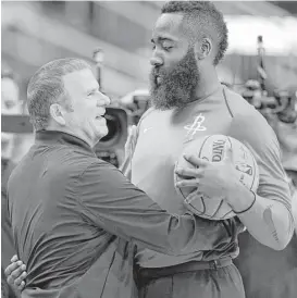  ?? Michael Wyke / Associated Press ?? Rockets owner Tilman Fertitta, left, has embraced the contributi­ons of point guard James Harden. “This guy leads these guys. This guy is a like a coach out there. … I couldn’t do this without this guy right here,” Fertitta said.