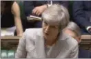  ?? PA VIA AP ?? British Prime Minister Theresa May speaking in the House of Commons about the Brexit split from Europe, in London Thursday. Addressing the House of Commons after publicatio­n of a draft political declaratio­n on postBrexit relations with the EU, May faced wide-ranging criticism from skeptical lawmakers Thursday.