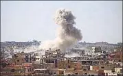  ?? AFP ?? Smoke billows following an air strike by Syrian government forces in the rebelheld area of Daraa on Wednesday.