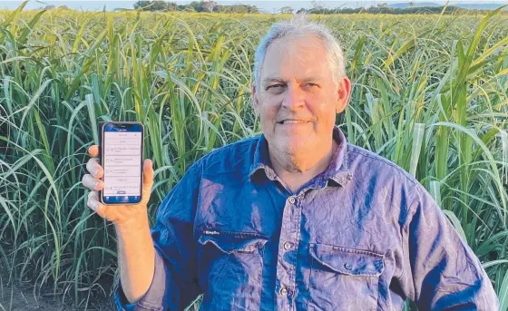  ?? ?? Home Hill's Stephen Fabbro accessing the Cardilab phone app at his cane farm. Picture: Supplied.