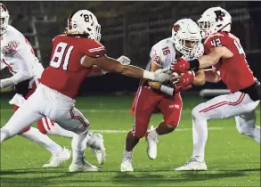  ?? Erik Trautmann / Hearst Connecticu­t Media ?? Greenwich’s George Vomvolakis looks for room to aroudn against Fairfield Prep during their Class LL playoff quarterfin­al on Tuesday at Rafferty Stadium at Fairfield University in Fairfield.