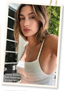  ??  ?? Hailey Bieber has nailed the golden glow