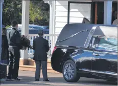  ??  ?? The body of Moe Getson is taken from the E. Gerald Rooney Memorial Chapel following his funeral service Saturday afternoon in Alberton. Moe Getson was one of two fishermen who lost their lives in a fishing boat tragedy at North Cape on Sept. 18. His body was recovered Sept 24.