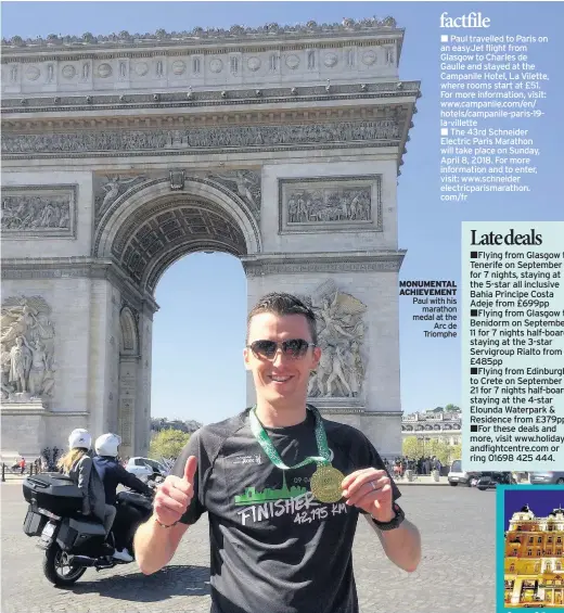  ??  ?? MONUMENTAL ACHIEVEMEN­T Paul with his marathon medal at the Arc de Triomphe