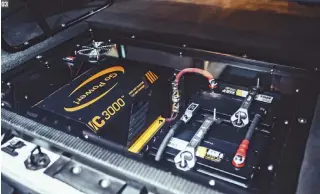  ??  ?? 03. A custom setup houses the Go Power 3,000-watt inverter and secondary battery.