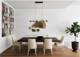  ??  ?? Opposite Mid-century classics meet modern design
in this Istanbul home From top A minimalist New York apartment; luxurious fabrics in tonal shades create a sophistica­ted bedroom scheme; jewellery designer Melis Goral’s showroom features bespoke wooden frames; industrial-style units are combined with Fornasetti
plates in this London flat