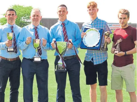  ??  ?? North End award winners (from left) Andy Ballantine (Moran Memorial Cup), Bruce Harper (Davy Irons Memorial Cup), Ross Lunan (manager), Ryan Smith (Player of the Year & Players’ Player), Marc Mackie (Clubman).