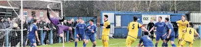  ??  ?? ■ Action from Boston Town versus Shepshed Dynamo. Niall Prendervil­le puts Shepshed 2-0 up with a bullet of a header. Photo by Steve Straw