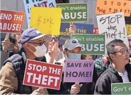  ?? JEFF CHIU/AP FILE ?? People rally to end the eviction moratorium outside City Hall in Oakland, Calif., April 11. Some landlords have gone without rental income for more than three years after Oakland approved the moratorium in March 2020.