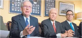  ?? J. SCOTT APPLEWHITE/ASSOCIATED PRESS ?? From left, Senate Majority Leader Mitch McConnell, R-Ky., Senate Finance Committee Chairman Orrin Hatch, R-Utah, and Treasury Secretary Steven Mnuchin, make statements as work gets underway on the Senate version of the GOP tax reform bill.