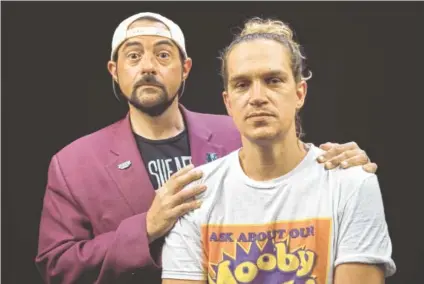  ?? PHOTO BY WILLY SANJUAN/INVISION/AP ?? Kevin Smith, left, and Jason Mewes pose during an interview to promote the film “Jay and Silent Bob Reboot.”