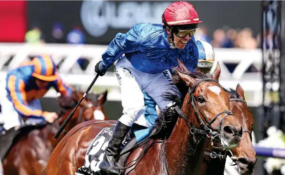  ?? Photo: Michael Dodge ?? SHEER DELIGHT: Jockey Kerrin McEvoy rides Cross Counter home to win the Melbourne Cup at Flemington.