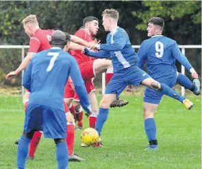  ??  ?? Goalmouth action from the Eastwood Hanley and Halmerend encounter.