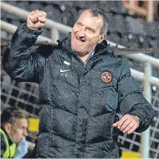  ??  ?? Csaba Laszlo celebrates the Dunfermlin­e win.