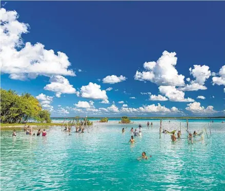  ?? ADRIAN WILSON NYT ?? Bacalar is a freshwater lagoon in Mexico that stretches out for about 26 miles and boasts an average January water temperatur­e of 79 degrees.