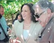  ?? Cathleen Decker Los Angeles Times ?? SEN. KAMALA HARRIS talks with Dennis Parnagian of Fowler Packing Co. in the Central Valley.