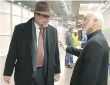  ?? JIM WELLS ?? Rabbi Shaul Osadchey, left, and Imam Syed Soharwardy attend services at the Genesis Centre on Friday. A variety of events around the city displayed solidarity and marked the recent Quebec tragedy.