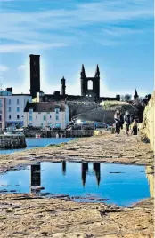  ?? ?? St Andrews Cathedral in silhouette above the town’s harbour. Pic by John Crichton.