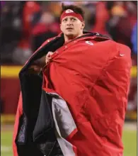  ?? (AP/Reed Hoffmann) ?? Quarterbac­k Patrick Mahomes (above) will play in Sunday’s AFC Championsh­ip Game against the Cincinnati Bengals, Kansas City Chiefs Coach Andy Reid said Monday. Mahomes has a high ankle sprain, which he sustained Saturday against the Jacksonvil­le Jaguars.